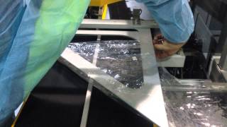 How to load Shrink Film onto an Automatic Shrink Wrapper or LBar Sealer [upl. by Mouldon307]