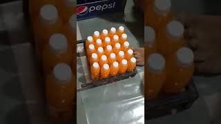 Manually Shrink film use to pack JuiceSoda bottles with Hot air gun [upl. by Ahsyekat]