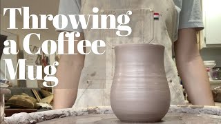 Throwing A Ceramic Coffee Mug  Pottery For Beginners [upl. by Gnus]