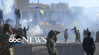 Shiite militia crowds storm US Embassy walls in Baghdad [upl. by Gawen653]