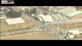 Aerial view of tsunami striking Sendai Japan [upl. by Lot]