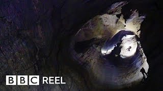 The daring journey inside the worlds deepest cave  BBC REEL [upl. by Yerdna]