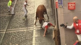 Pamplona Attack Watch as bull gores three runners [upl. by Ranice285]