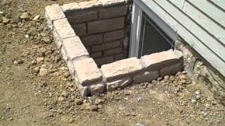 Custom Stone Egress Window Wells [upl. by Aehtrod]